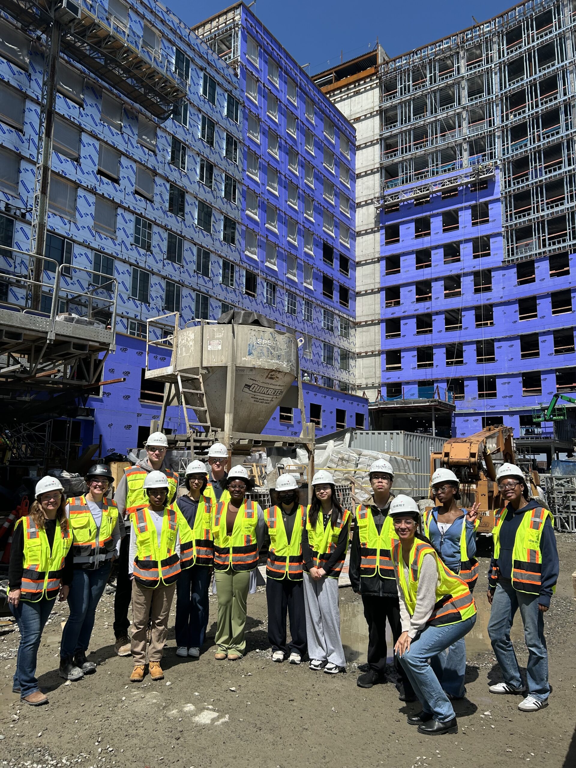 Summer Search Boston participants at an active job site